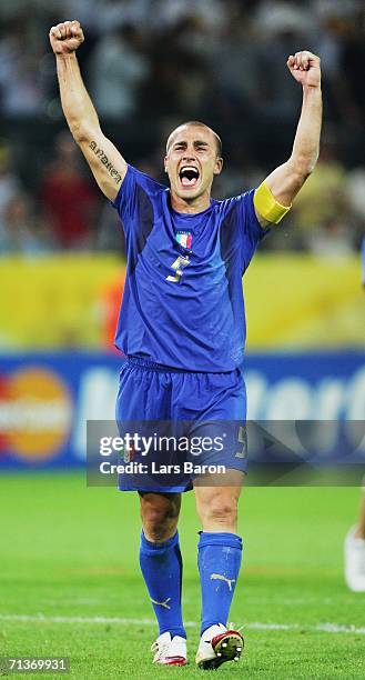 Fabio Cannavaro of Italy celebrates his team's victory at the end of the FIFA World Cup Germany 2006 Semi-final match between Germany and Italy...