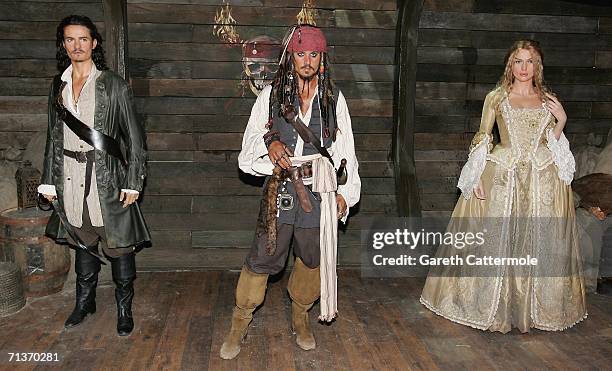 Waxwork models of Orlando Bloom as Will Turner, Johnny Depp as Captain Jack Sparrow and Keira Knightly as Elizabeth Swan from Pirates of The...