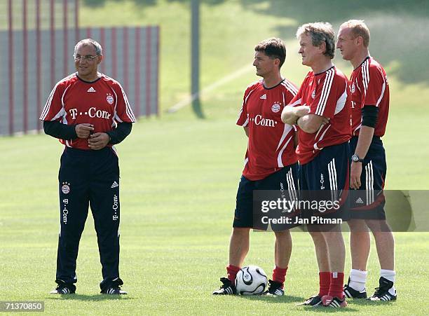 The coaches of FC Bayern Munich Felix Magath,Werner Leuthard, Sepp Maier and Seppo Eichkorn stand next to each other during the first training...