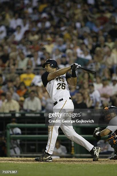 Catcher Ronny Paulino of the Pittsburgh Pirates bats against the Detroit Tigers at PNC Park on July 1, 2006 in Pittsburgh, Pennsylvania. The Pirates...