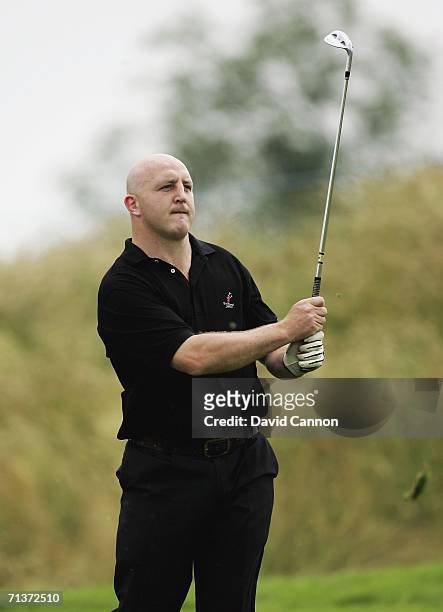 Former Irish Rugby captain Keith Wood hits his second shot at the 12th during the pro-am for the 2006 Smurfit Kappa European Open on the Smurfit...