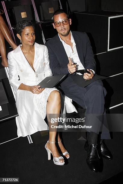 Justin Chambers and his girl friend attend the Giorgio Armani show as part of Paris Haute Couture Collections on July 5, 2006 in Paris, France.