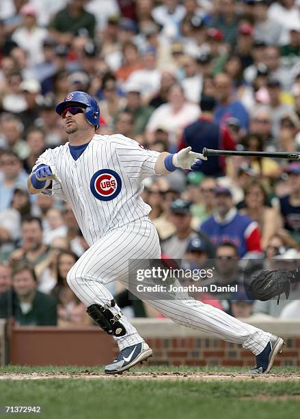 Phil Nevin of the Chicago Cubs swings at the pitch during the game against the Chicago White Sox on June 30, 2006 at Wrigley Field in Chicago,...