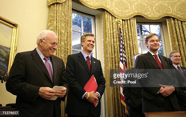 Vice President Dick Cheney, Press Secretary Tony Snow, and Deputy Secretary of State Robert B. Zoellick listen while U.S. President George W. Bush...