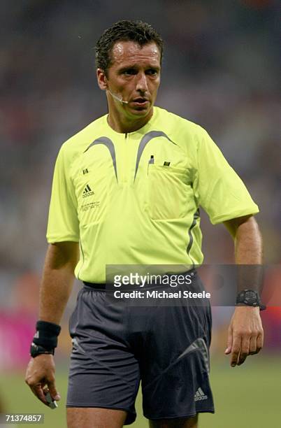 Referee Jorge Larrionda of Uruguay watches play during the FIFA World Cup Germany 2006 Semi-final match between Portugal and France at the Stadium...