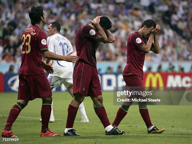 Helder Postiga, Luis Figo and Simao Sabrosa of Portugal react, after a missed chance on the French goal during the FIFA World Cup Germany 2006...