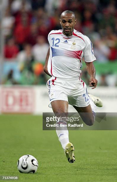 Thierry Henry of France runs with the ball during the FIFA World Cup Germany 2006 Semi-final match between Portugal and France at the Stadium Munich...