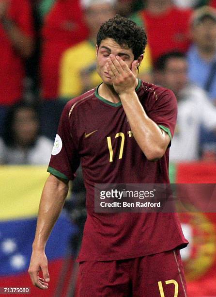Dejected Cristiano Ronaldo of Portugal reacts following his team's 1-0 defeat and exit from the competition during the FIFA World Cup Germany 2006...
