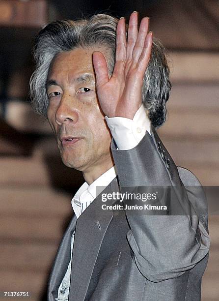 Japanese Prime Minister Junichiro Koizumi leaves the Prime Minister's Official Residence on July 5, 2006 in Tokyo, Japan. North Korea test-fired six...