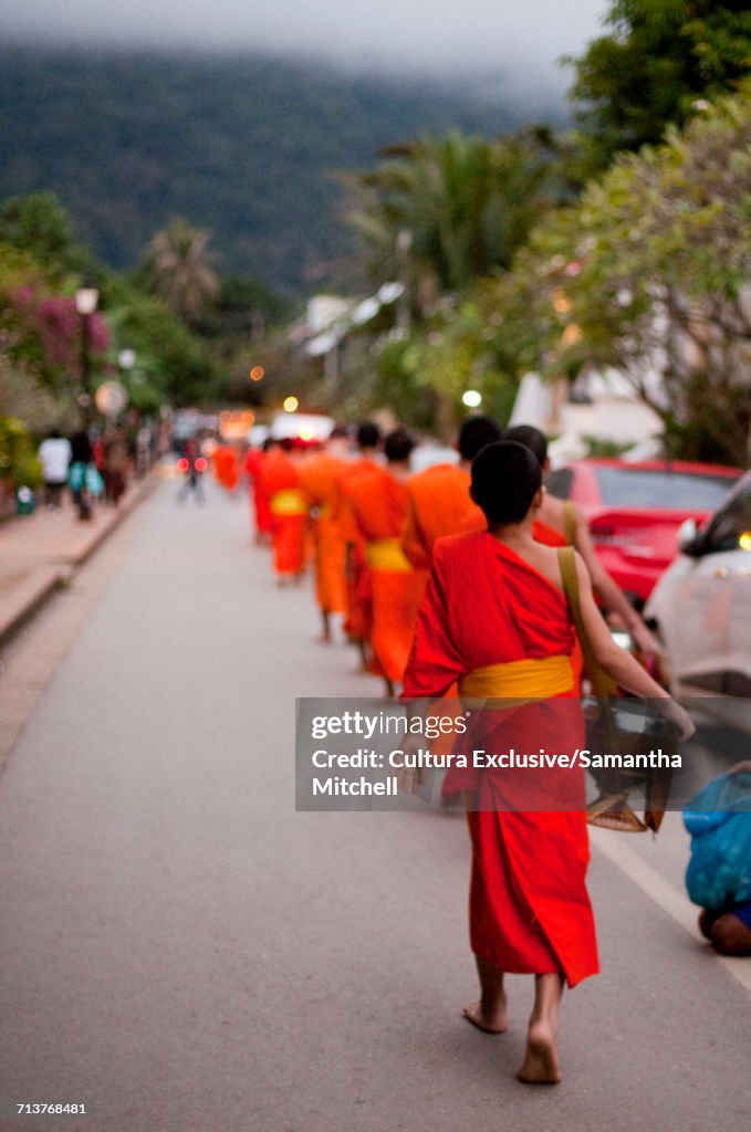 Monks collecting alms from citizens, Luang Prabang, Laos