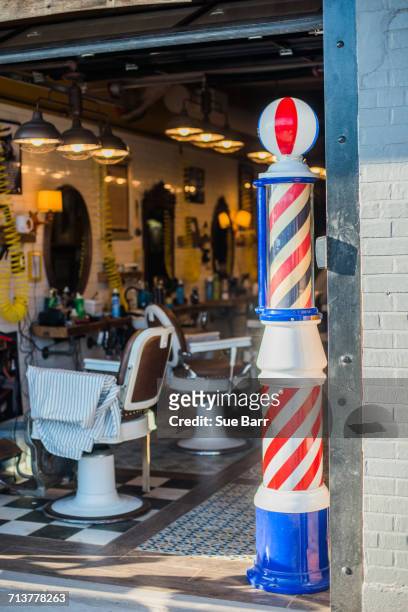 barber shop - barber pole stock pictures, royalty-free photos & images