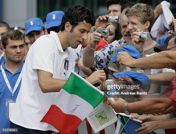 Fabio Grosso signs autographs after an Italy National Football Team press conference on July 6, 2006 in Duisburg, Germany.