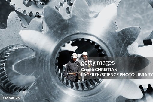 Engineer Cogs Engineers With Cogs And Gears High-Res Vector Graphic - Getty Images
