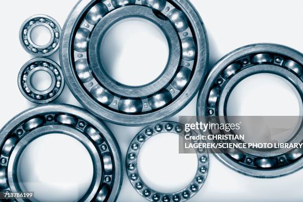metal cogs and ball bearings - ball bearing stock pictures, royalty-free photos & images