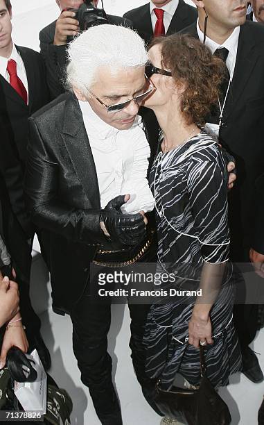 Karl Lagerfeld and Vanessa Paradis attend the Chanel Fashion show, during Paris Fashion Week Fall-Winter 2006/07 on July 6, 2006 in Paris, France.