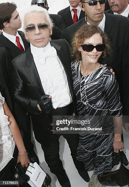 Karl Lagerfeld and Vanessa Paradis attend the Chanel Fashion show, during Paris Fashion Week Fall-Winter 2006/07 on July 6, 2006 in Paris, France.