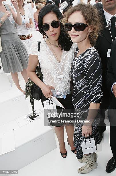 Vanessa and sister Alison Paradis attend the Chanel Fashion show, during Paris Fashion Week Fall-Winter 2006/07 on July 6, 2006 in Paris, France.
