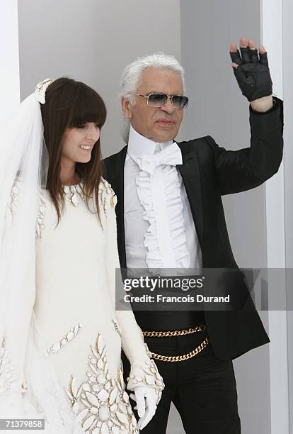 German designer Karl Lagerfeld waves at the end of the Chanel Fashion show, during Paris Fashion Week Fall-Winter 2006/07 at XXXX on July 6, 2006 in...