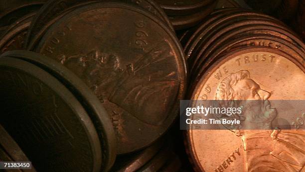 Pennies lay in a pile July 6, 2006 in Des Plaines, Illinois. According to the U.S. Mint says a penny costs more to make than it's worth, 1.2 cents,...