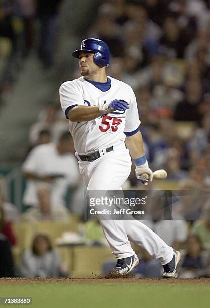 Russell Martin of the Los Angeles Dodgers swings at the pitch against the New York Mets during the game on June 7, 2006 at Dodger Stadium in Los...