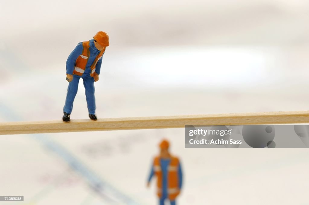 Figurines of construction worker