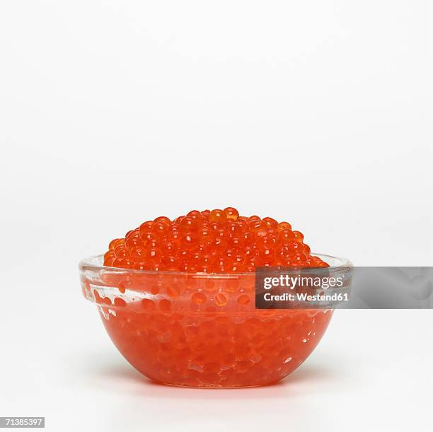little dish with red caviar - fish roe stock pictures, royalty-free photos & images