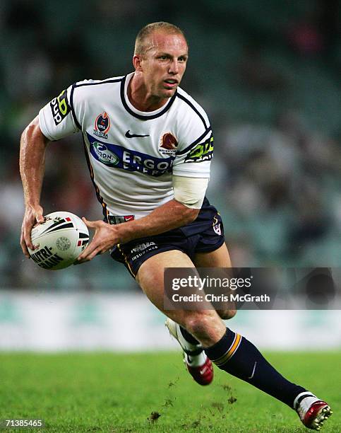 Darren Lockyer of the Broncos looks to offload the ball during the round six NRL match between the Sydney Roosters and the Brisbane Broncos at Aussie...