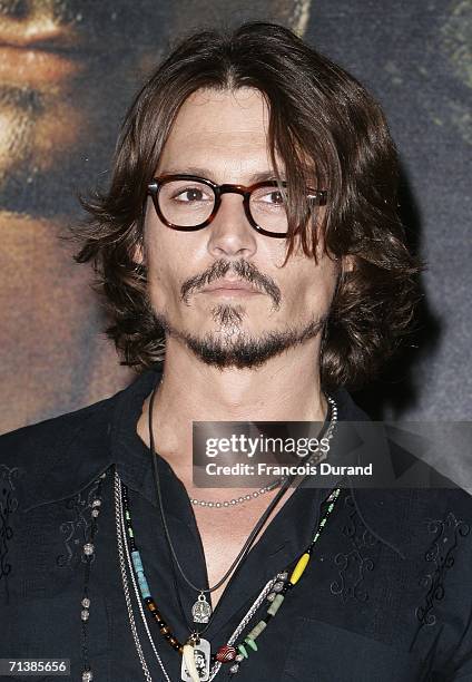 Actor Johnny Depp attends the French premiere of "Pirates of the Caribbean 2: Dead Man's Chest" at the Gaumont Marignan Cinema July 6, 2006 in Paris,...