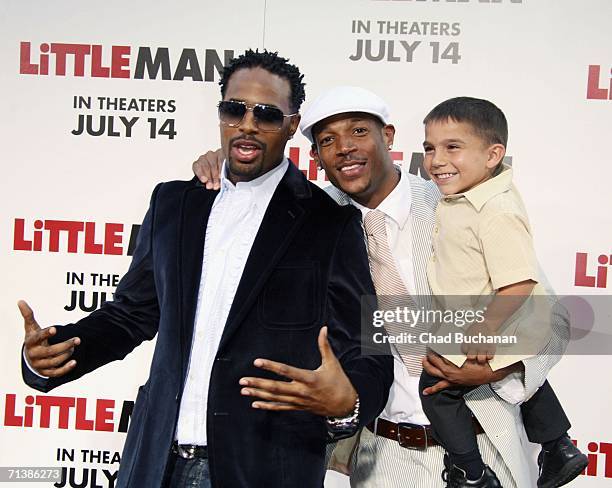 Actor Marlon Wayans, Linden Porco and Shawn Wayans arrive at Sony Pictures Premiere of "Little Man" at the Mann National Theater on July 6, 2006 in...