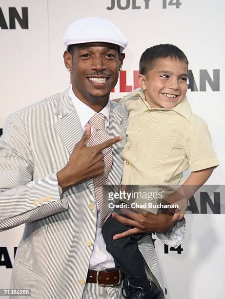 Actor Marlon Wayans and Linden Porco arrive at Sony Pictures Premiere of "Little Man" at the Mann National Theater on July 6, 2006 in Westwood,...