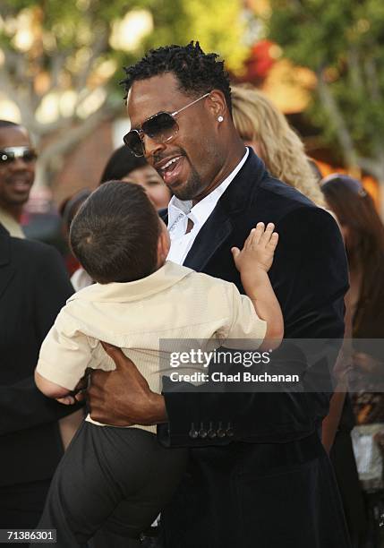 Actor Shawn Wayans and Linden Porco arrive at Sony Pictures Premiere of "Little Man" at the Mann National Theater on July 6, 2006 in Westwood,...