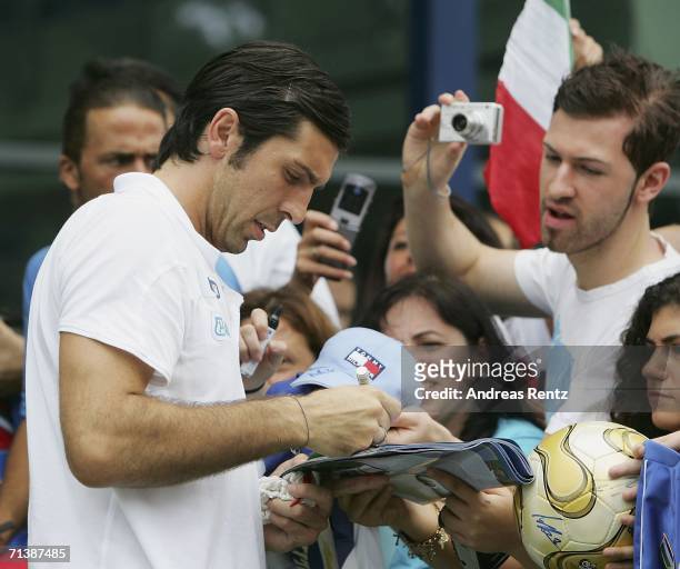 Goalkeeper Gianluigi Buffon signs autographs after an Italy National Football Team press conference on July 7, 2006 in Duisburg, Germany.