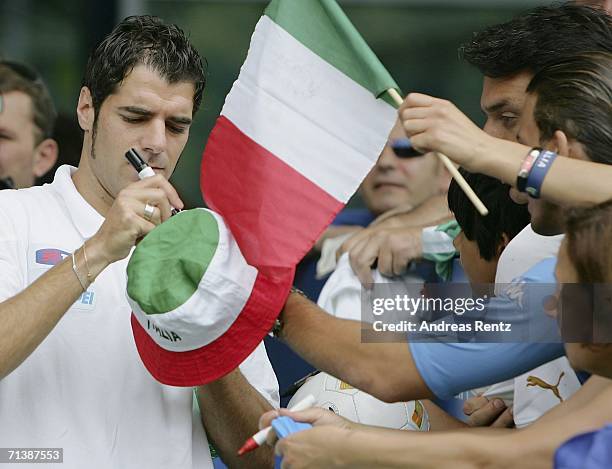 Simone Perrotta signs autographs after an Italy National Football Team press conference on July 7, 2006 in Duisburg, Germany.