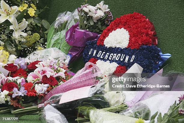 Flowers are laid in order to remember the victims of 7/7 bombings at Russell Square underground station on July 7, 2006 in London, England. On July...