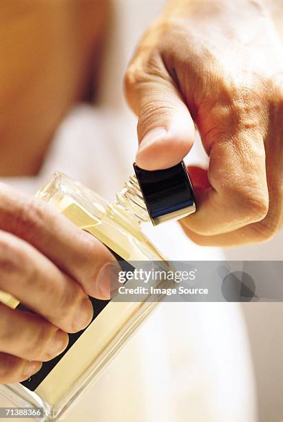 bottle of aftershave - aftershave stock pictures, royalty-free photos & images