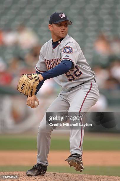 Saul Rivera of the Washington Nationals pitches during a baseball game against the Baltimore Orioles on June 25, 2006 at RFK Stadium in Washington...