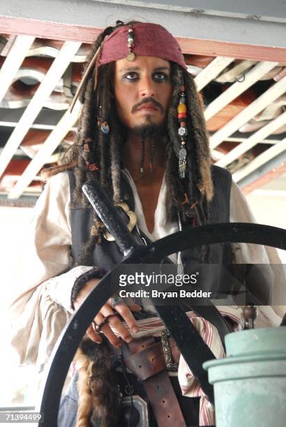 Wax figure of Jack Sparrow, Johnny Depp's character from the movie "Pirates of the Caribbean: Dead Man's Chest," stands on display on a Circle Line...