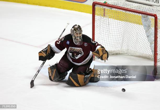Goaltender Frederic Cassivi of the Hershey Bears makes a stop against the Milwaukee Admirals during game six of the AHL Calder Cup Finals on June 15,...