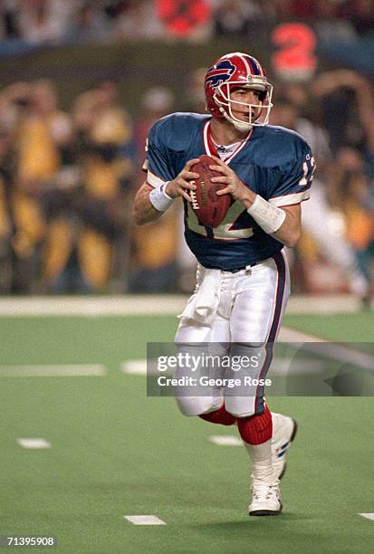 Quarterback Jim Kelly of the Buffalo Bills looks to pass during Super Bowl XXVIII against the Dallas Cowboys at the Georgia Dome on January 30, 1994...