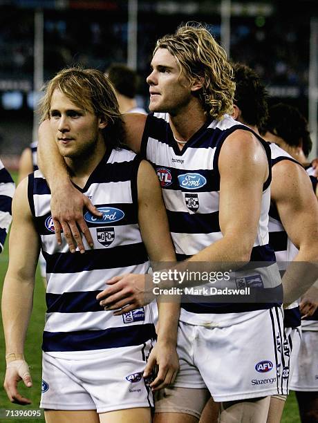 Gary Ablett and Cameron Mooney of the Cats celebrate after winning the round 14 AFL match between the Carlton Blues and Geelong Cats at Telstra Dome...