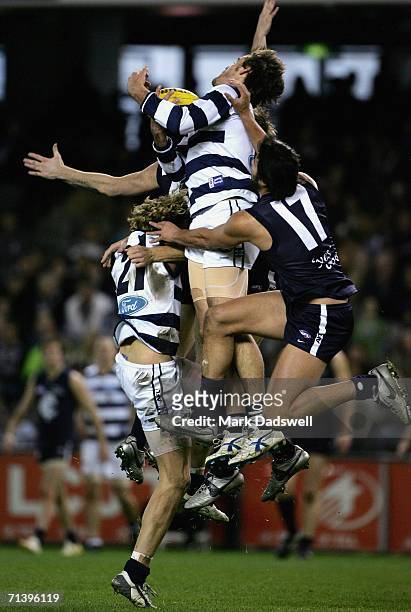 Matthew McCarthy of the Cats flies for a mark during the round 14 AFL match between the Carlton Blues and Geelong Cats at Telstra Dome July 8, 2006...