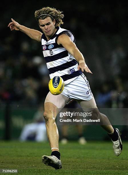 Cameron Mooney of the Cats kicks downfield during the round 14 AFL match between the Carlton Blues and Geelong Cats at Telstra Dome July 8, 2006 in...