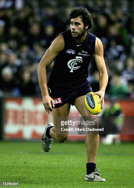Setanta O'Hailpin of the Blues looks for a teammate during the round 14 AFL match between the Carlton Blues and Geelong Cats at Telstra Dome July 8,...