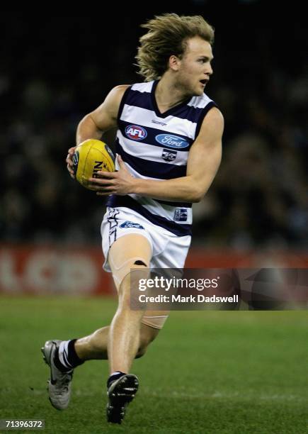 Gary Ablett of the Cats gathers the balll during the round 14 AFL match between the Carlton Blues and Geelong Cats at Telstra Dome July 8, 2006 in...