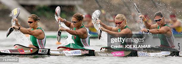 From left: Timea Paksy, Katalin Kovacs, Natasa Janics and Alexandra Kereszetesi of Hungary finish the women's K4 1,000 meters during the European...