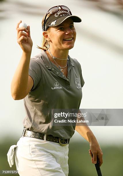 Annika Sorenstam of Sweden waves to the crowd on the 1st during the third round of the HSBC Women's World Match Play Championship on July 8, 2006 at...