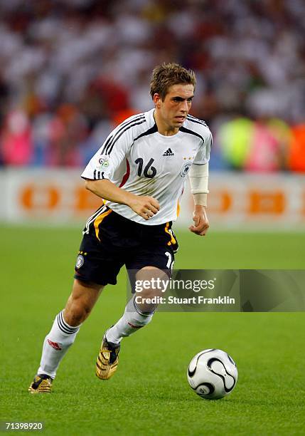 Philipp Lahm of Germany controls the ball during the FIFA World Cup Germany 2006 Third Place Play-off match between Germany and Portugal played at...