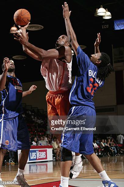 Chris Owens of the Phoenix Suns shoots over Renaldo Balkman of the New York Knicks during the 2006 Toshiba Vegas Summer League on July 8, 2006 at the...