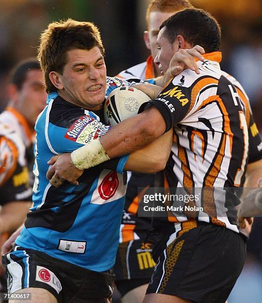 Reece Williams of the Sharks in action during the round 18 NRL match between the Cronulla Sharks and Wests Tigers played at Toyota Park on July 9,...