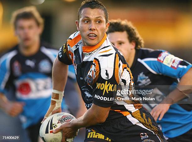 Scott Prince of the Tigers in action during the round 18 NRL match between the Cronulla Sharks and Wests Tigers played at Toyota Park on July 9, 2006...